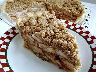 /><br/> <br/> I make apple pie a lot-the double crust kind-but every now and then, I like something different. My daughter Robin made this recipe first and told me how good it is. After hearing her rave, I knew I had to try it.<br/> <br/> Robin's right-this pie is incredible. Just the right mix of apples to the crunchy topping. Oh my gosh, did we enjoy this. It's like apple crisp in a pie....TOO good. I've always done what my Mom does when she makes apple pie-she always sprinkles vanilla extract over the top of the apples-so that's what I did on this one. <br/> <br/> This pie is AWESOME........and I mean AWESOME.......trust me on this one, folks. My thanks to Vicki for sharing the recipe on the Taste of Home board.</span></div> <div><span style=